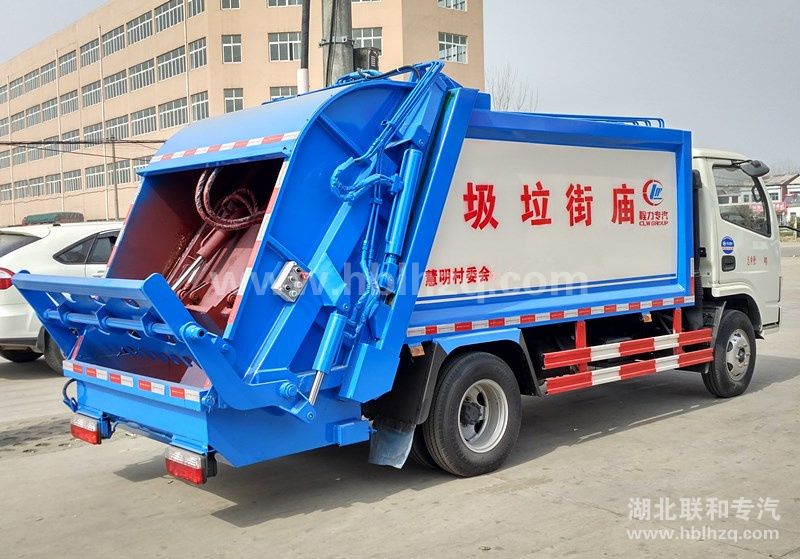 慧明村庙街购买的压缩式垃圾车